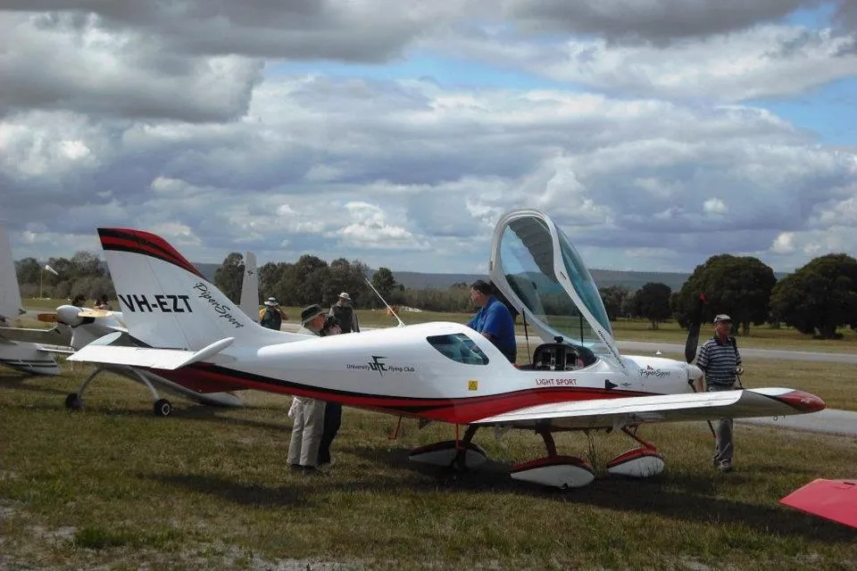 VH-EZT parked on the grass at Serpentine Airfield with its canopy open