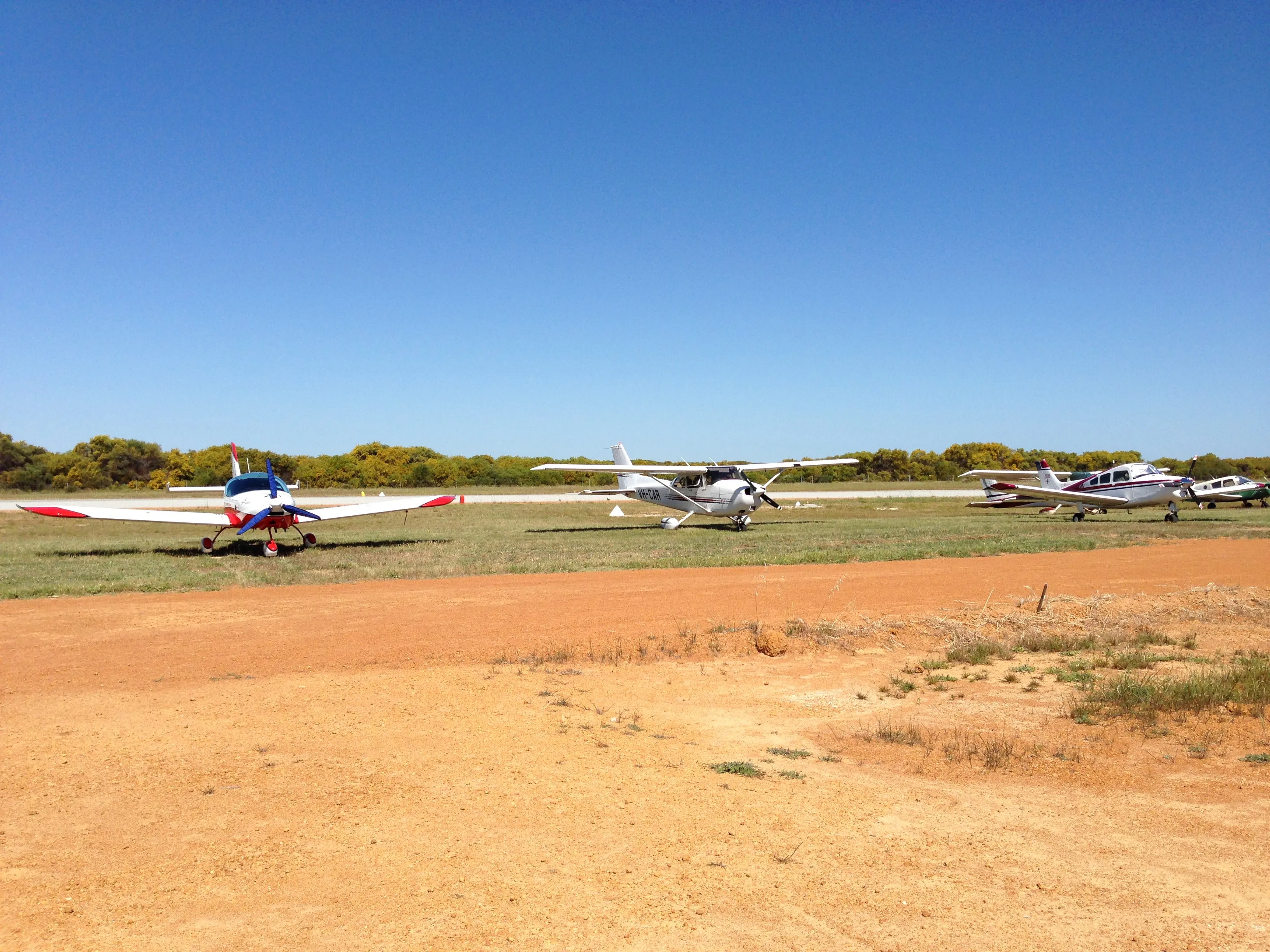 VH-EZT parked with visiting aircraft at Jurien Bay