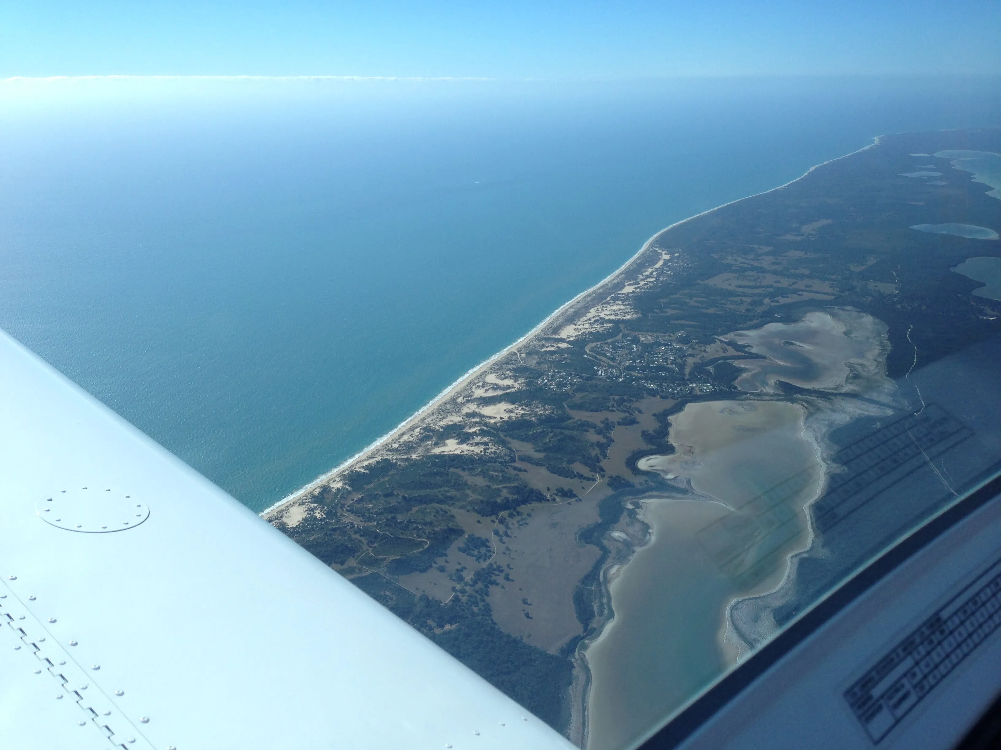 Beaches and salt lakes along the coast south of Mandurah, seen from VH-EZT