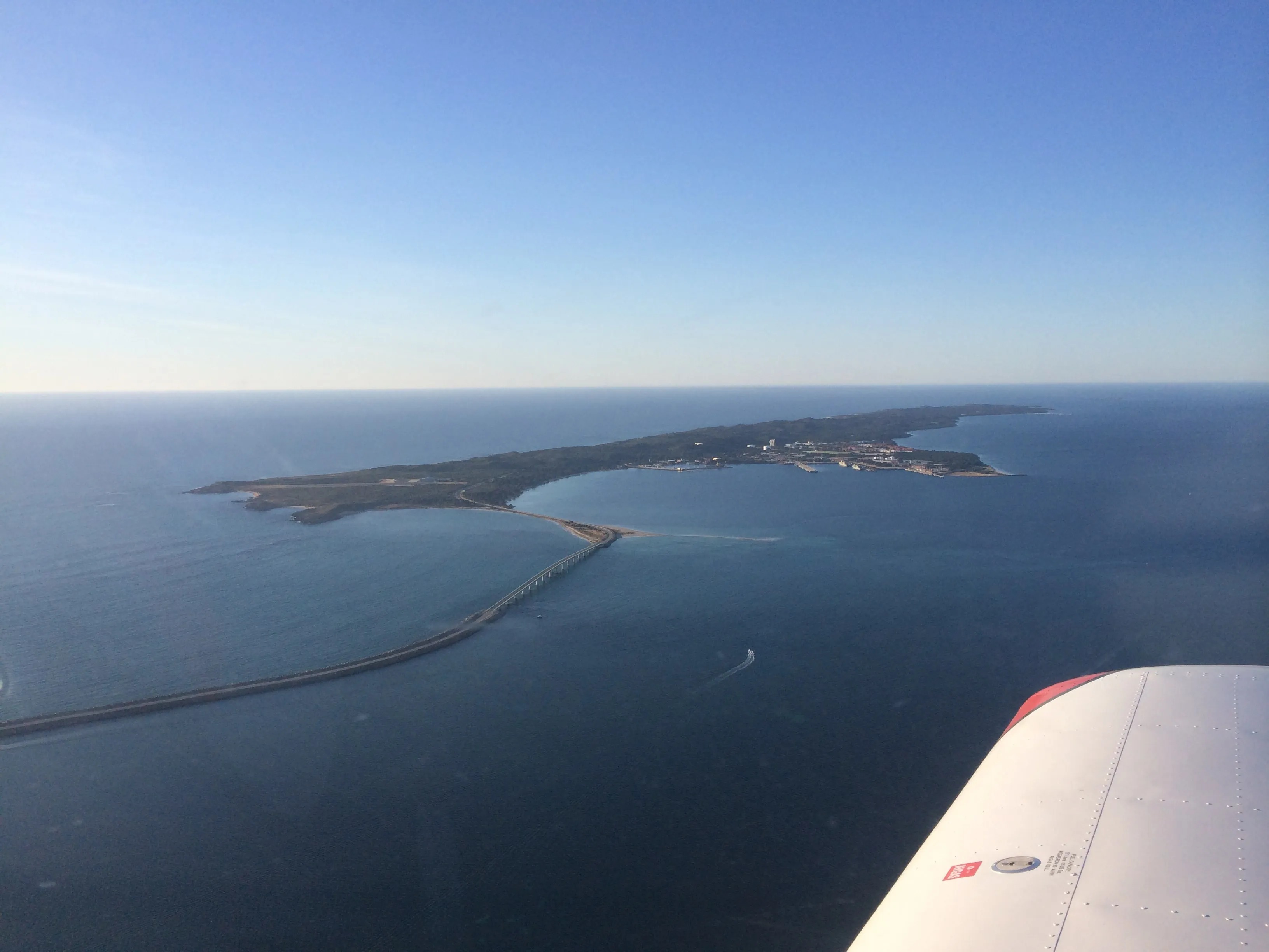 Looking along Garden Island from VH-EZT, with the causeway in the foreground