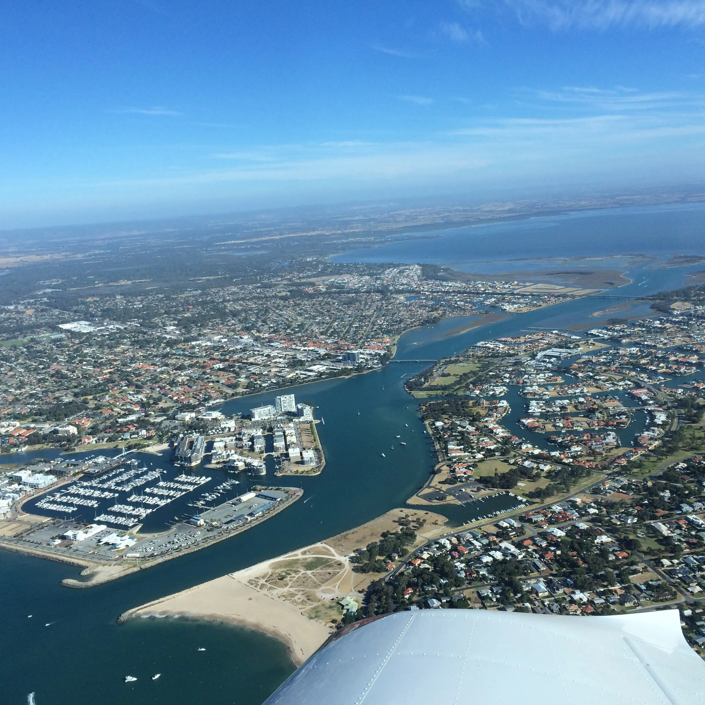 Mandurah's canal estates and marina seen from VH-EZT