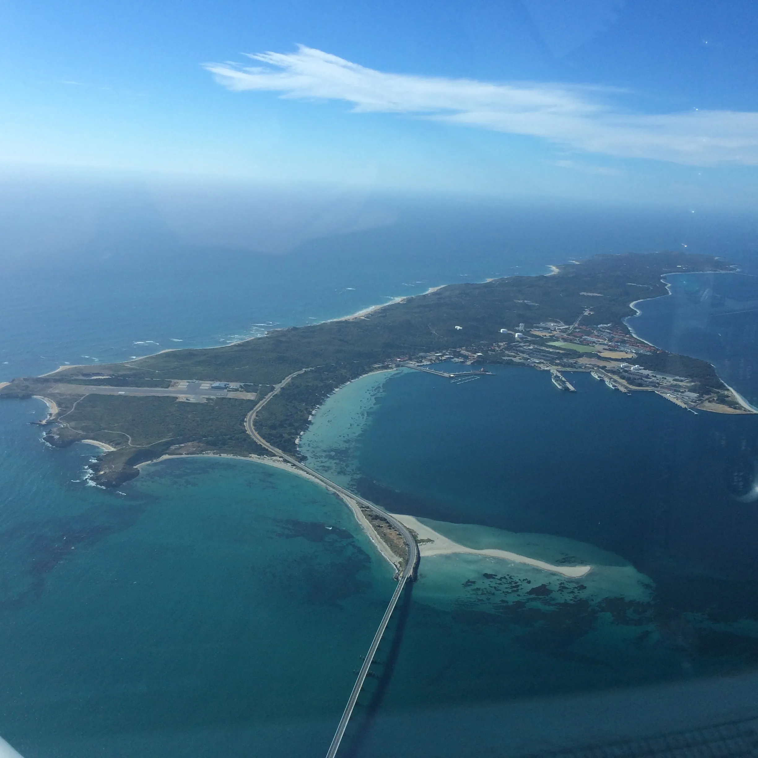 Garden Island's causeway and HMAS Stirling seen from VH-EZT