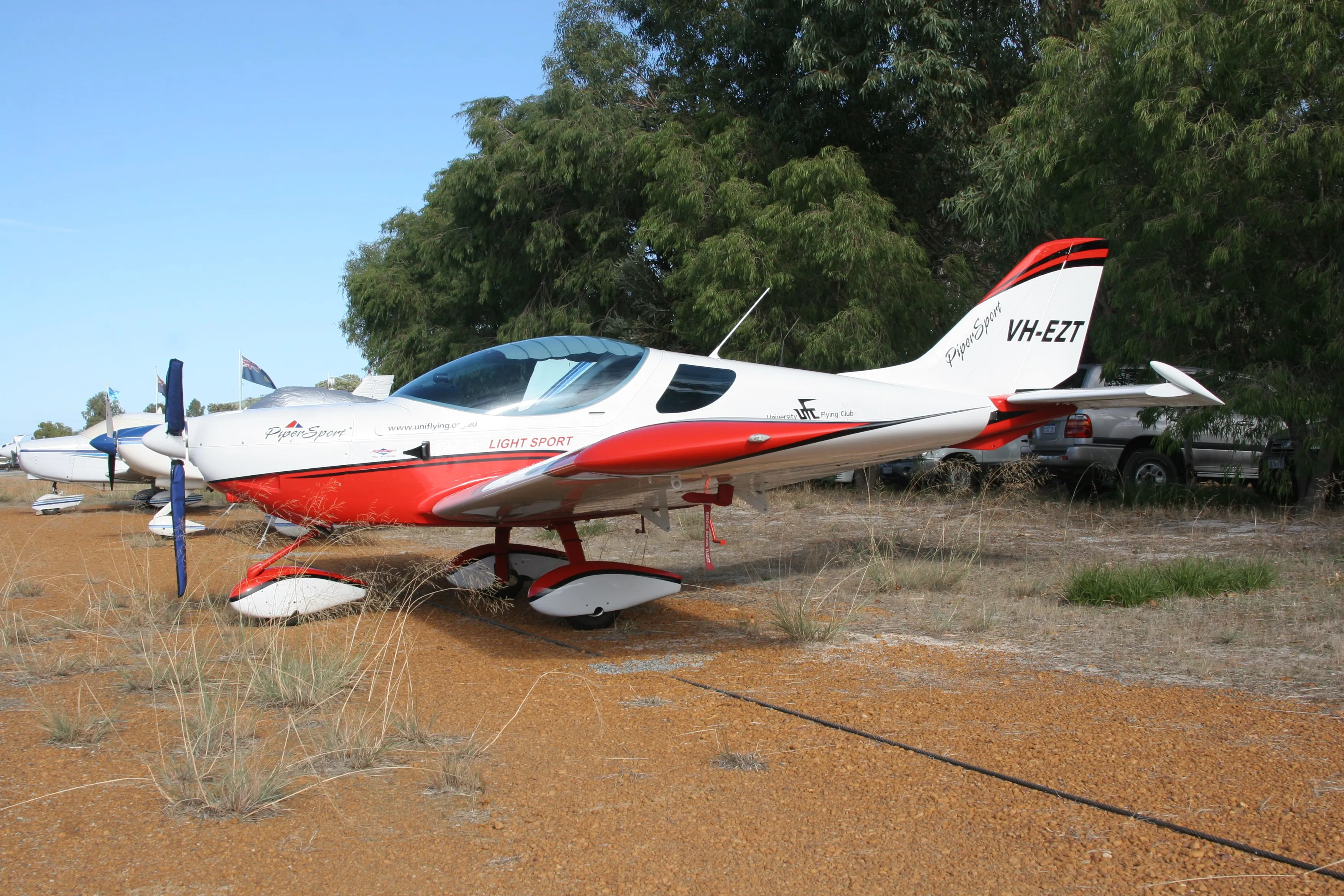 VH-EZT parked on the gravel at Serpentine Airfield