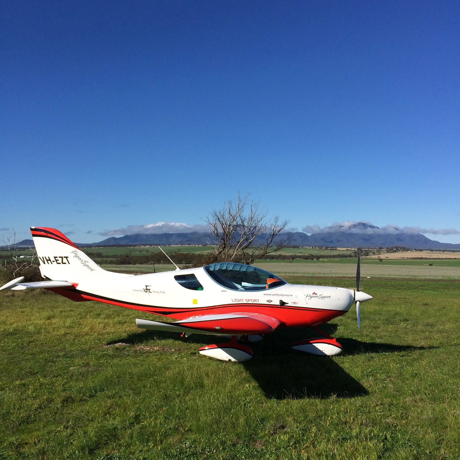 VH-EZT at the lily dutch windmill runway airstrip