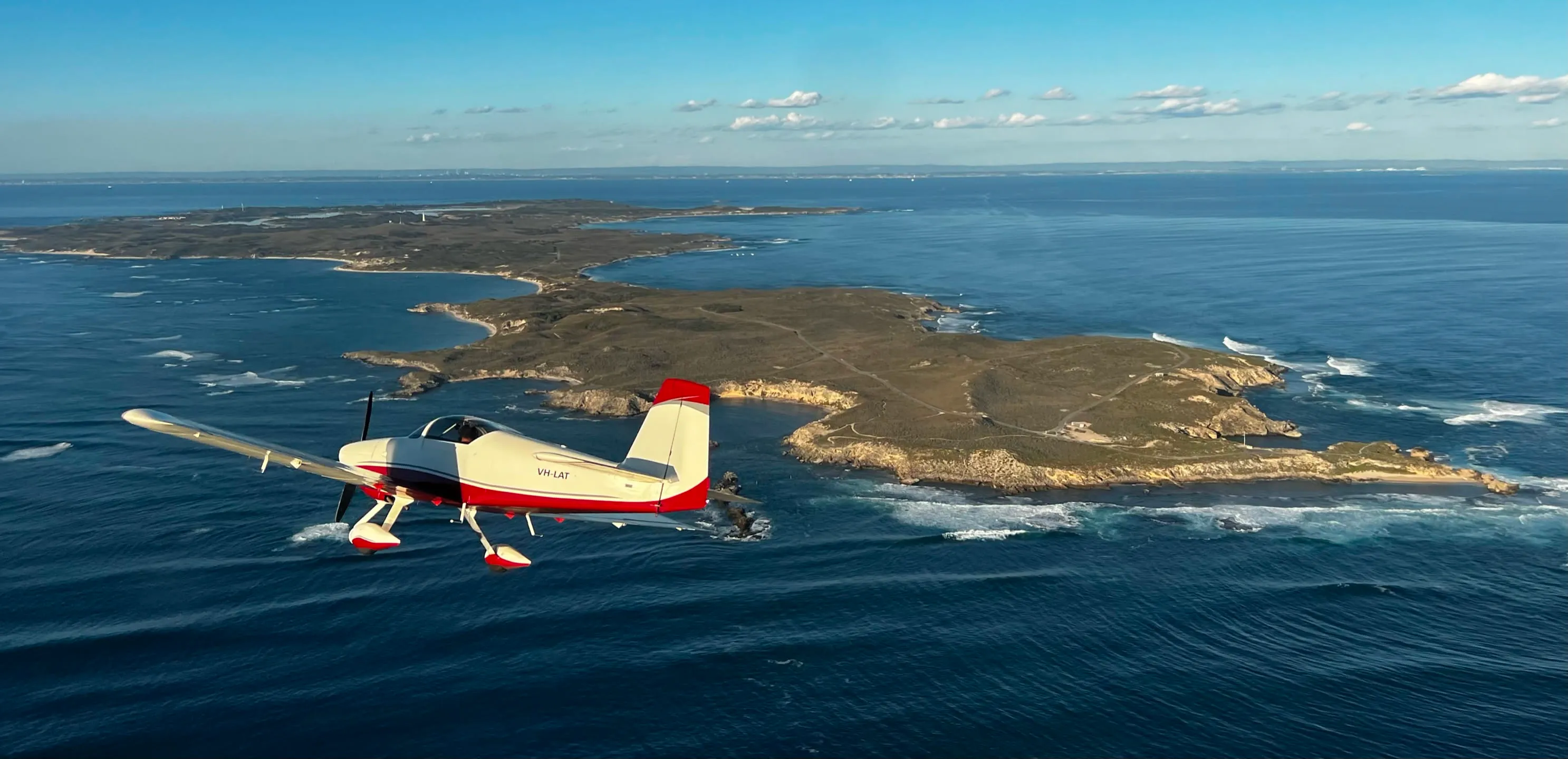 The club's Van's RV-9A, VH-LAT, in flight over Rottnest Island